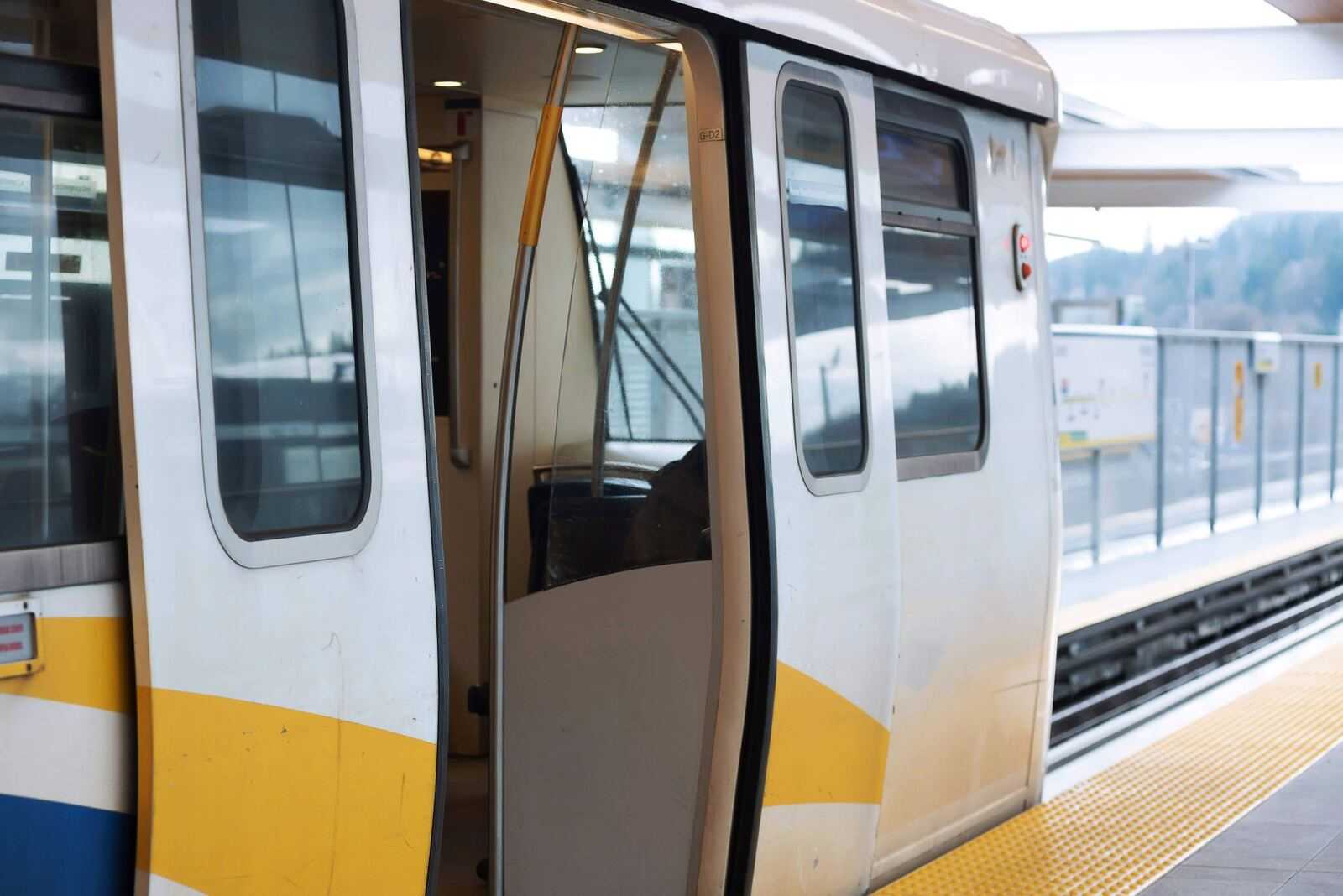 SkyTrain doors open at a Surrey station